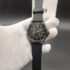 Tommy Hilfiger style men's automatic skeleton watch featuring a polished black case, a matching black outer dial ring, an exposed mechanical core,