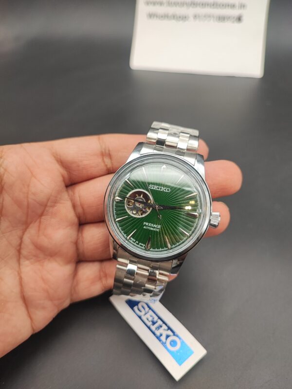 Seiko Presage automatic open-heart watch with emerald green sunburst dial and stainless steel bracelet